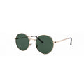 Lunettes de soleil dorées avec des verres teintés kaki !
